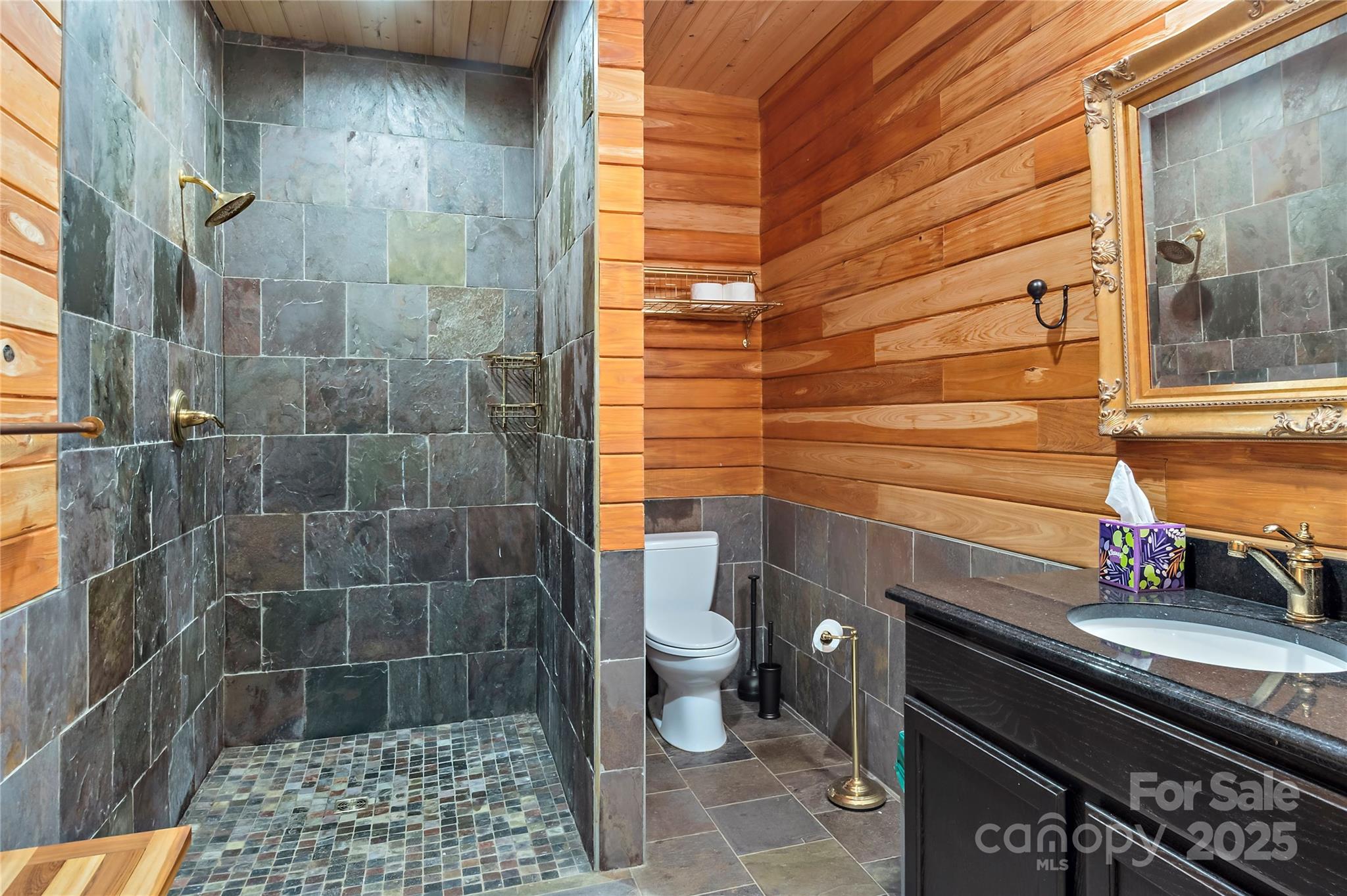 2950 Beroth Road Pfafftown, NC 27040 - Photo 25 of 39 a bathroom with a sink a toilet and shower