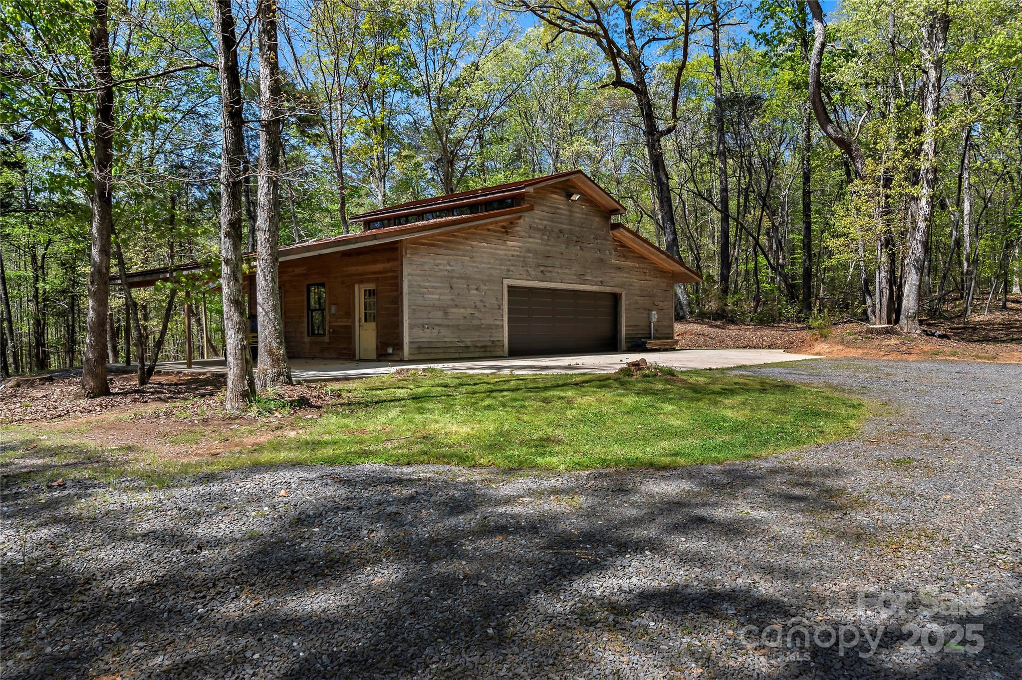 2950 Beroth Road Pfafftown, NC 27040 - Photo 36 of 39 a view of a house with backyard and trees