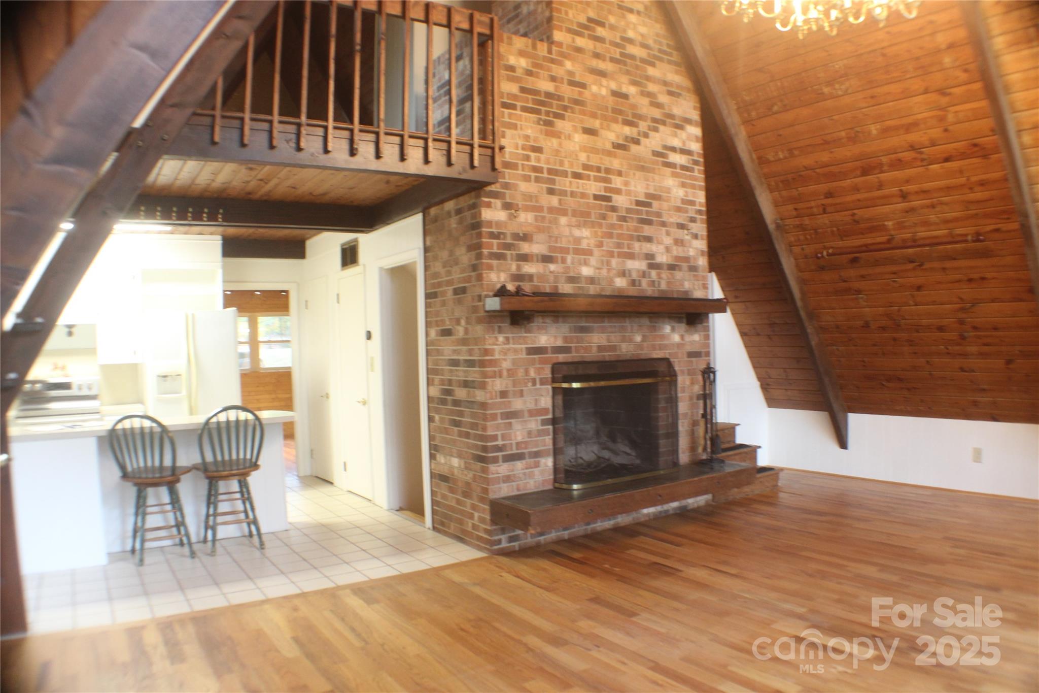 2950 Beroth Road Pfafftown, NC 27040 - Photo 6 of 39 a view of a livingroom with furniture and a fireplace