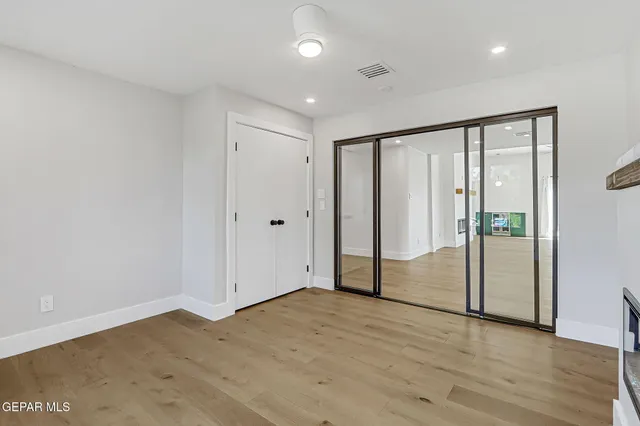 a large kitchen with stainless steel appliances kitchen island a large island in the center