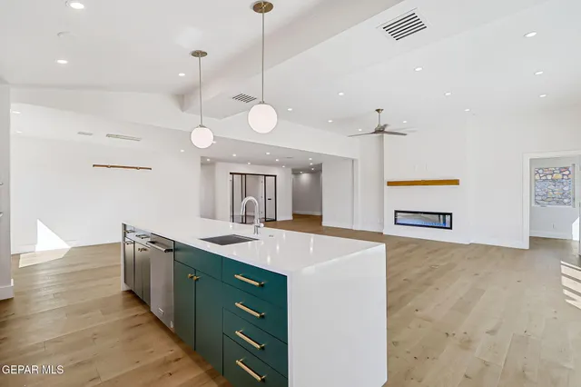 a bathroom with a double vanity sink mirror and