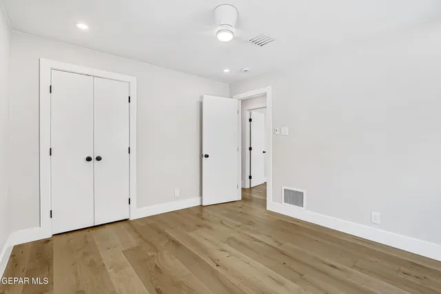 an aerial view of residential house with outdoor space and parking