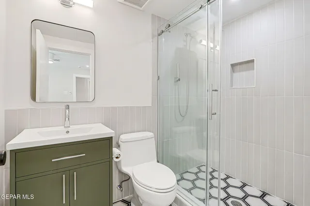 an aerial view of a house with a garden