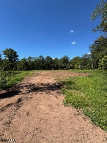 a view of a lake with mountain in the background