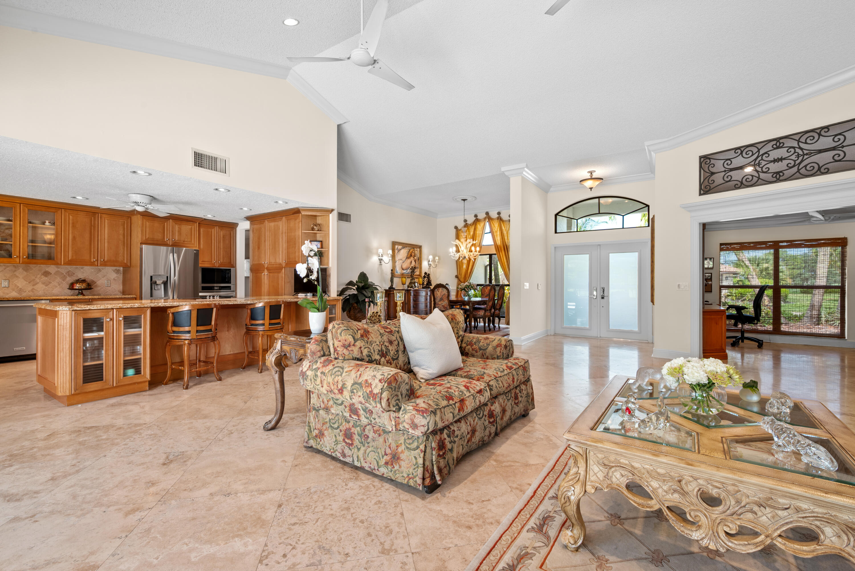10984 Boca Woods Lane Boca Raton, FL 33428 - Photo 13 of 80 a living room with furniture and a large window