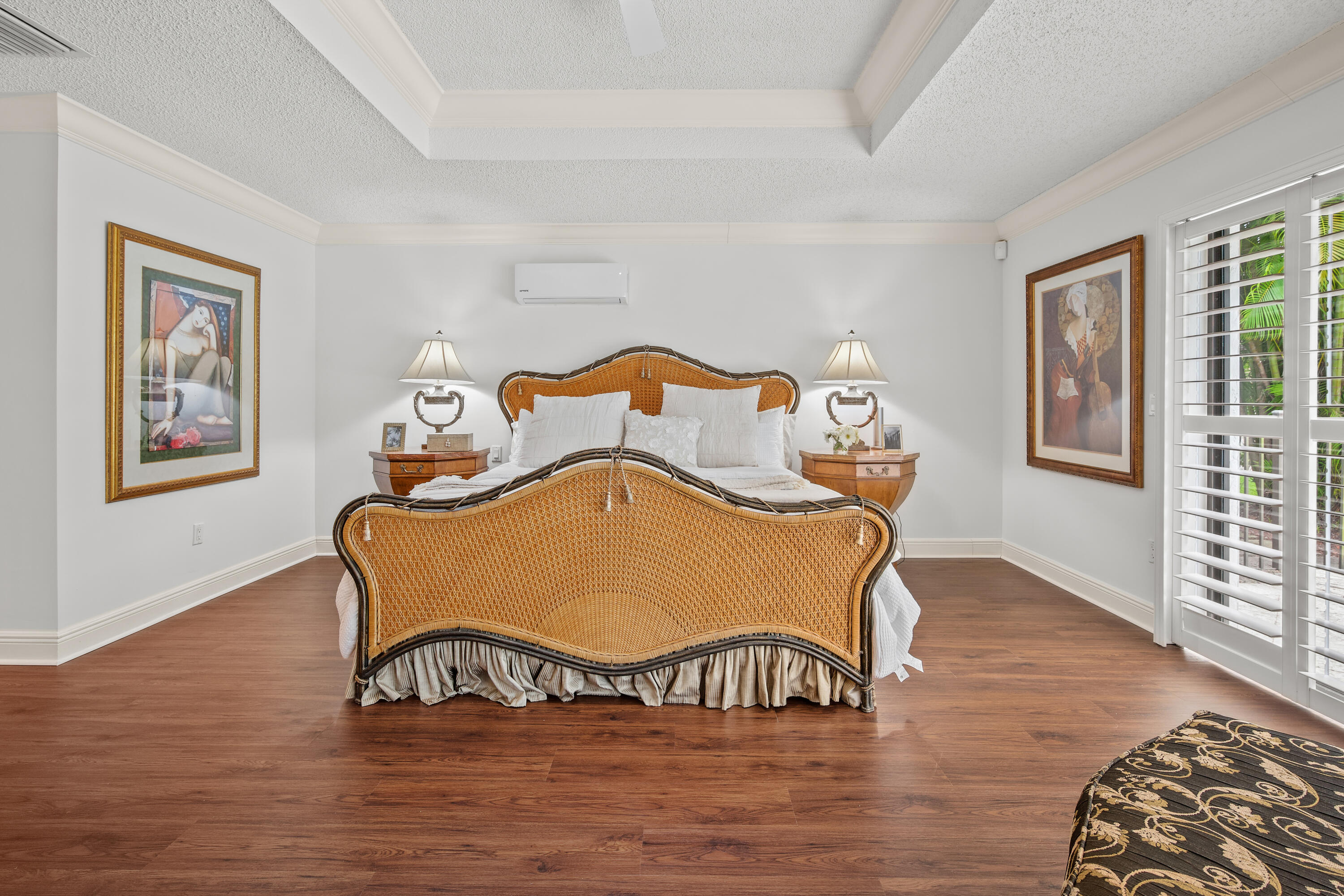 10984 Boca Woods Lane Boca Raton, FL 33428 - Photo 28 of 80 a bed sitting in a bedroom next to a window