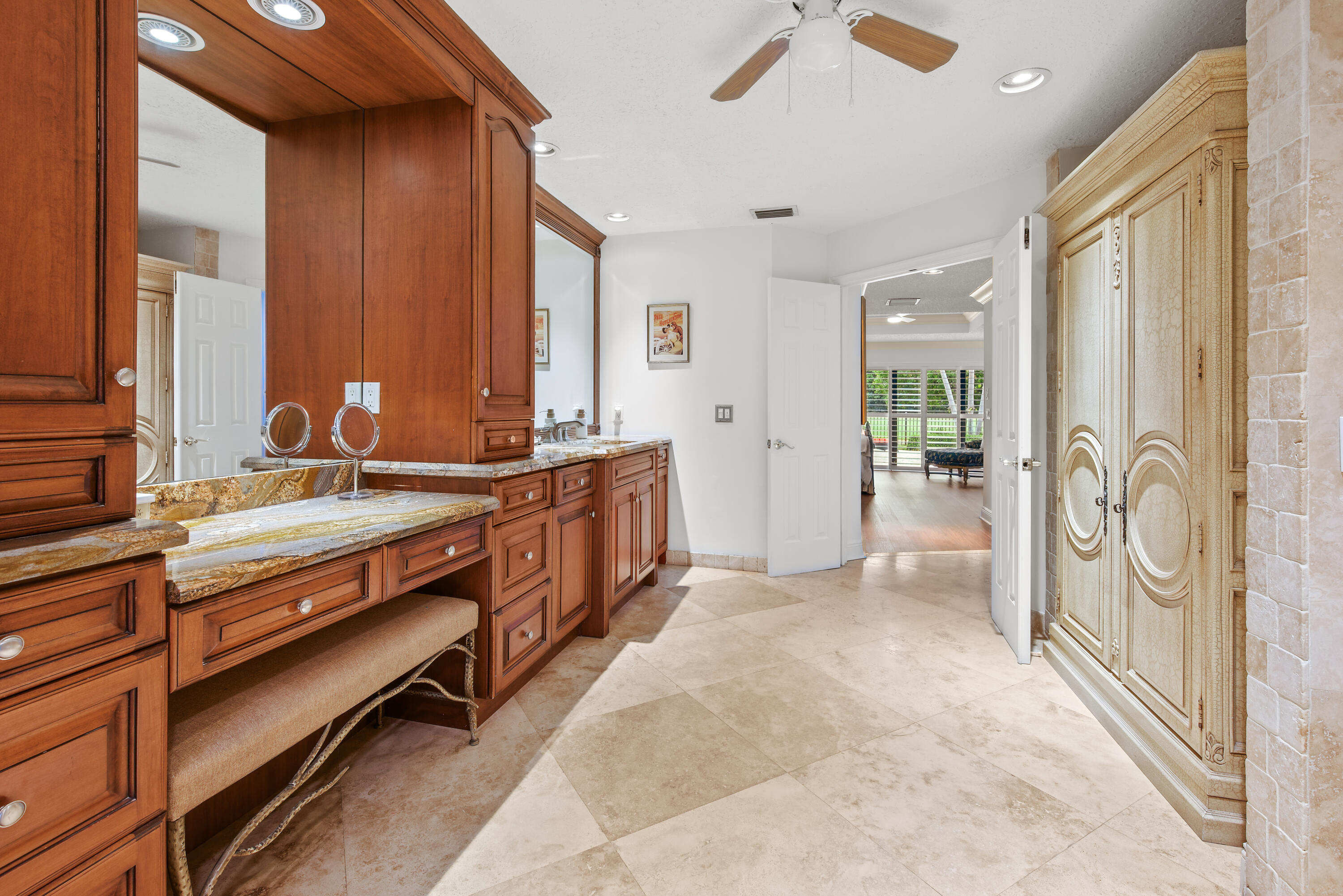 10984 Boca Woods Lane Boca Raton, FL 33428 - Photo 32 of 80 a spacious bathroom with a double vanity sink a mirror and a shower
