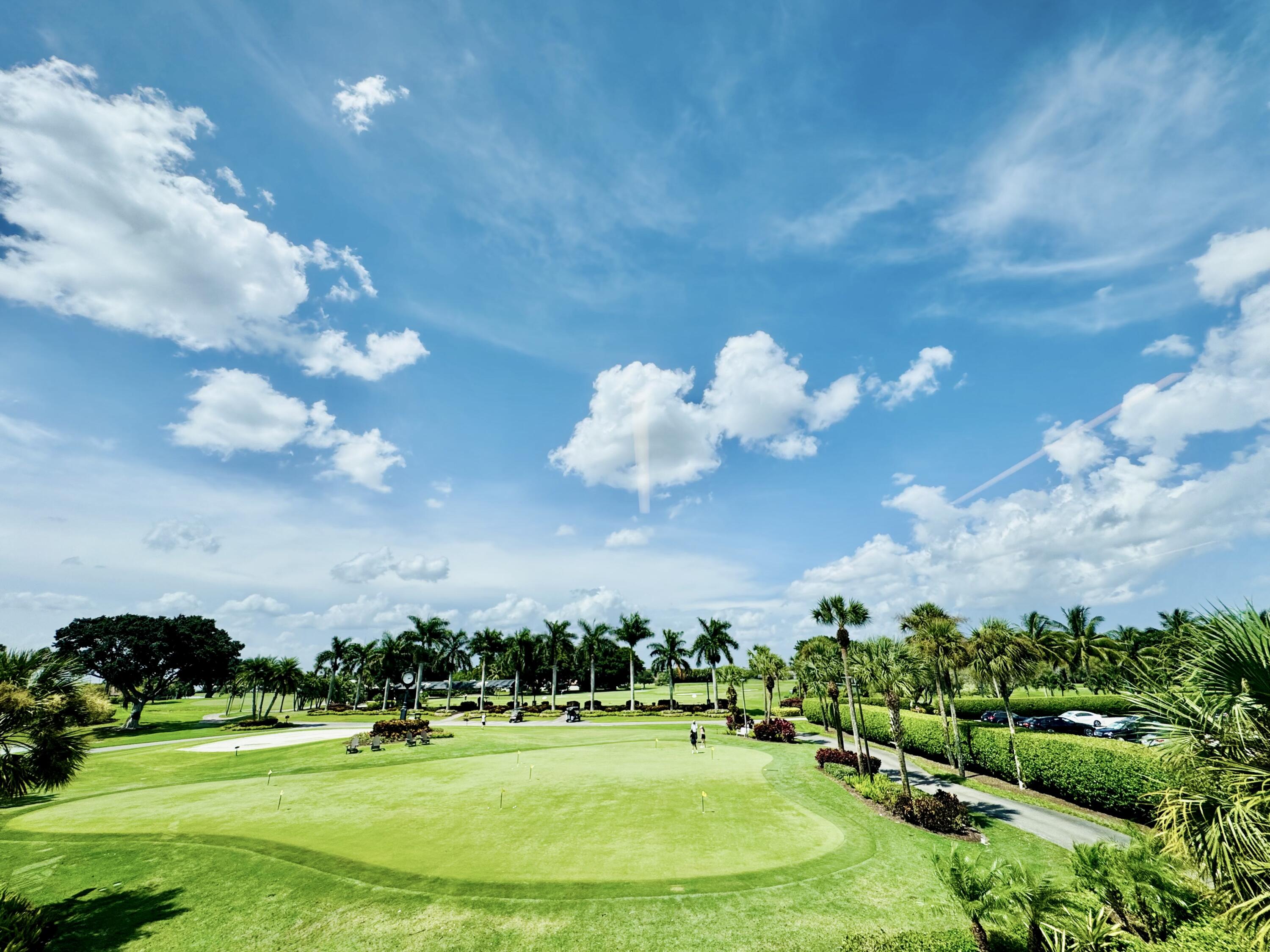 10984 Boca Woods Lane Boca Raton, FL 33428 - Photo 56 of 80 a view of a golf course with a fountain