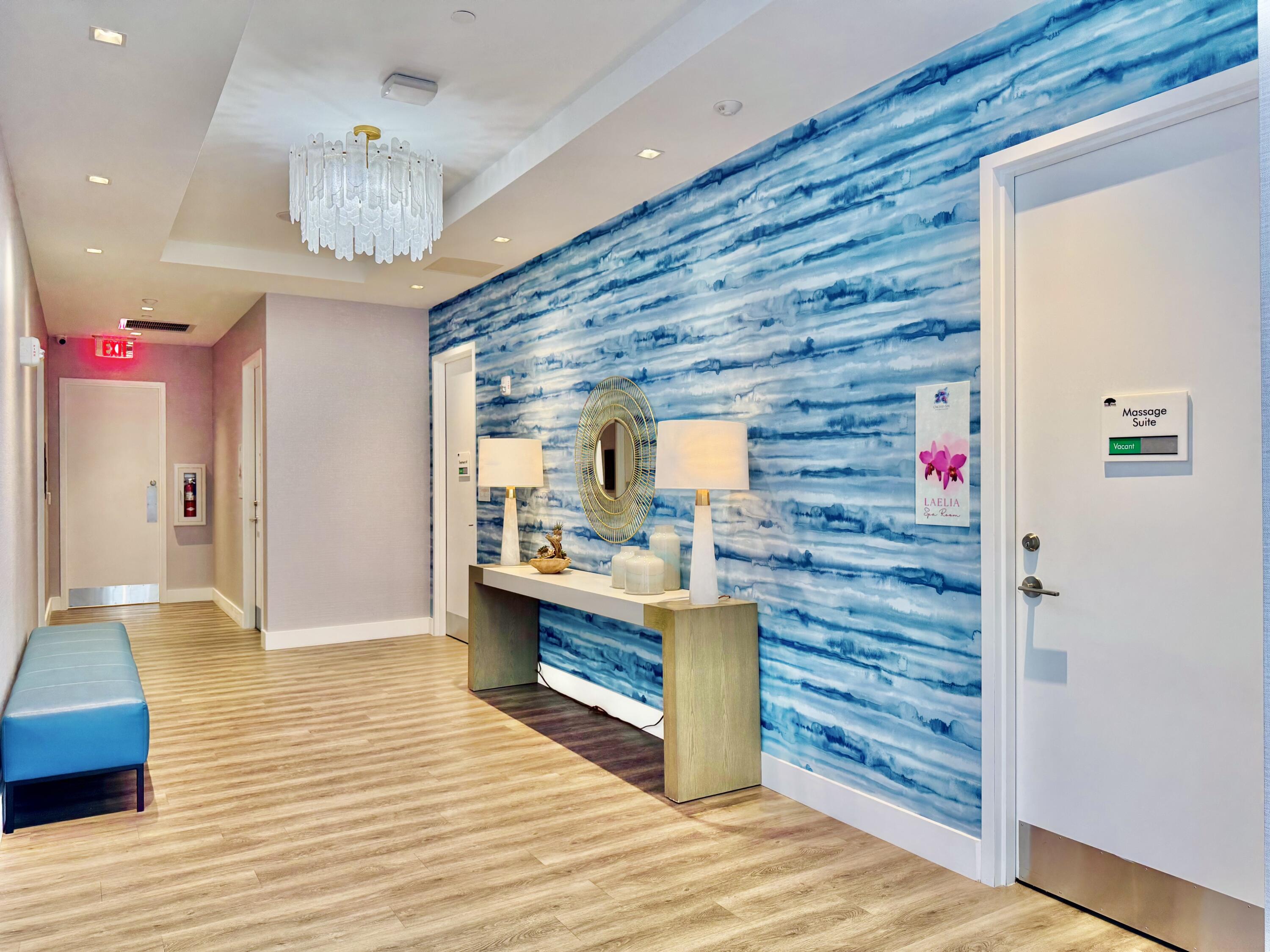 10984 Boca Woods Lane Boca Raton, FL 33428 - Photo 74 of 80 a view of a hallway with the wooden floor and entryway