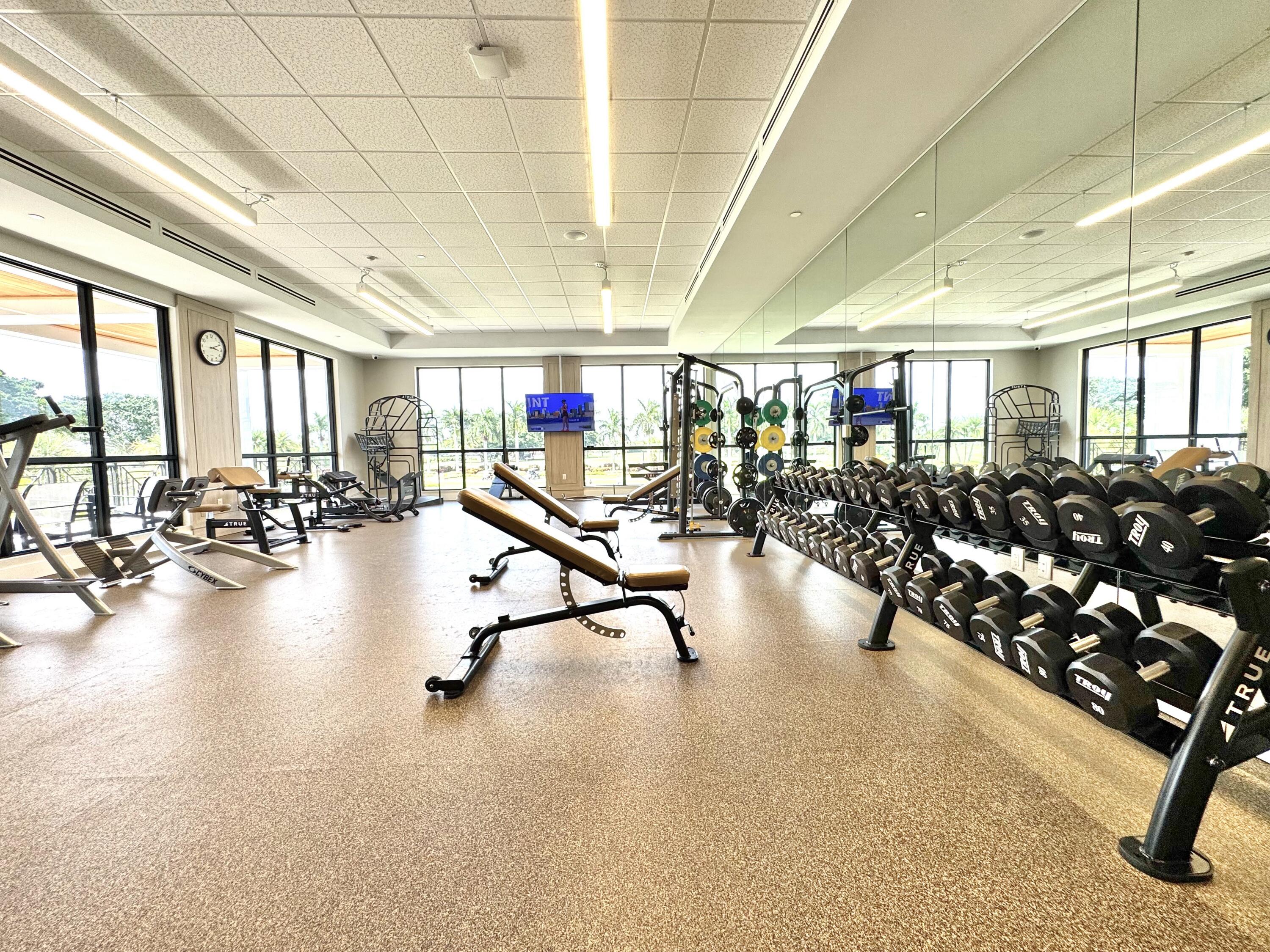 10984 Boca Woods Lane Boca Raton, FL 33428 - Photo 76 of 80 a view of a room with gym equipment