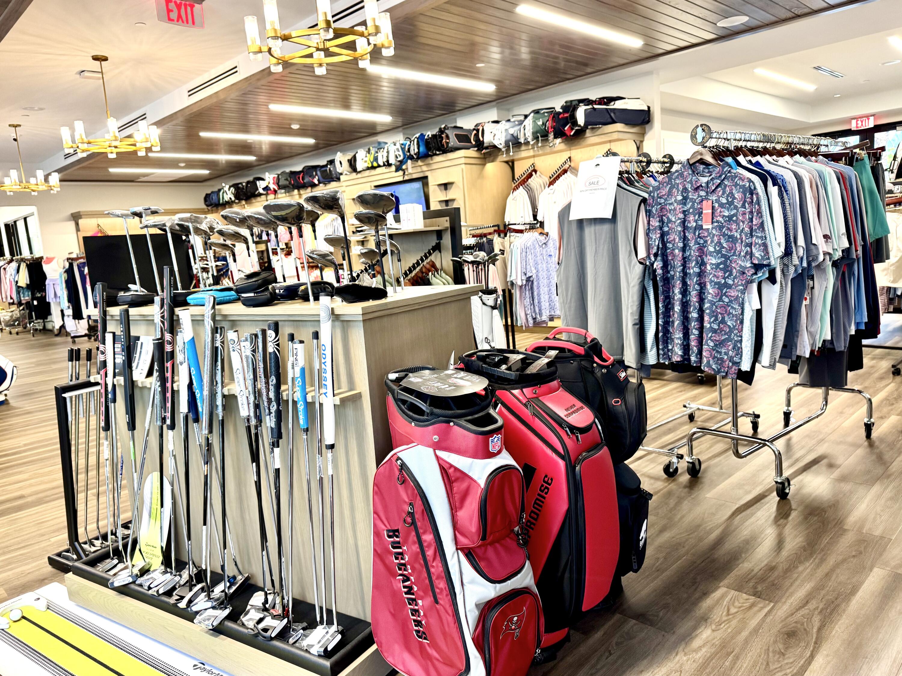 10984 Boca Woods Lane Boca Raton, FL 33428 - Photo 78 of 80 a view of walk in closet with clothes and shoes