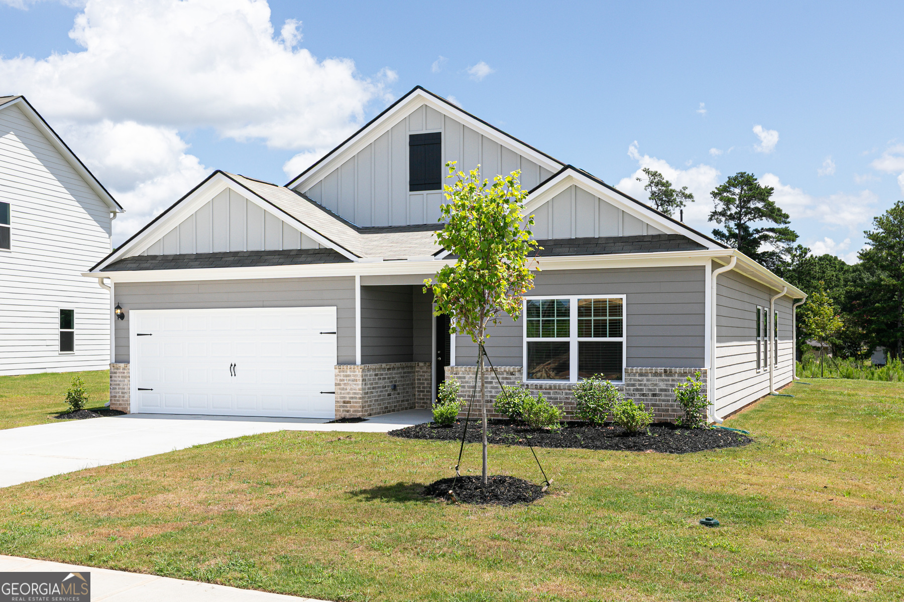 526 Plant Road Conyers, GA 30013 - Photo 2 of 11 a house view with a garden space