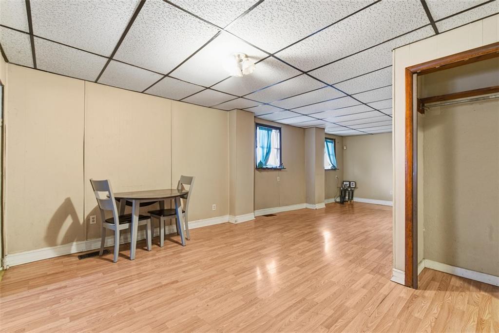 1057 Keene Street Springdale, PA 15144 - Photo 15 of 50 a view of a livingroom with furniture and wooden floor
