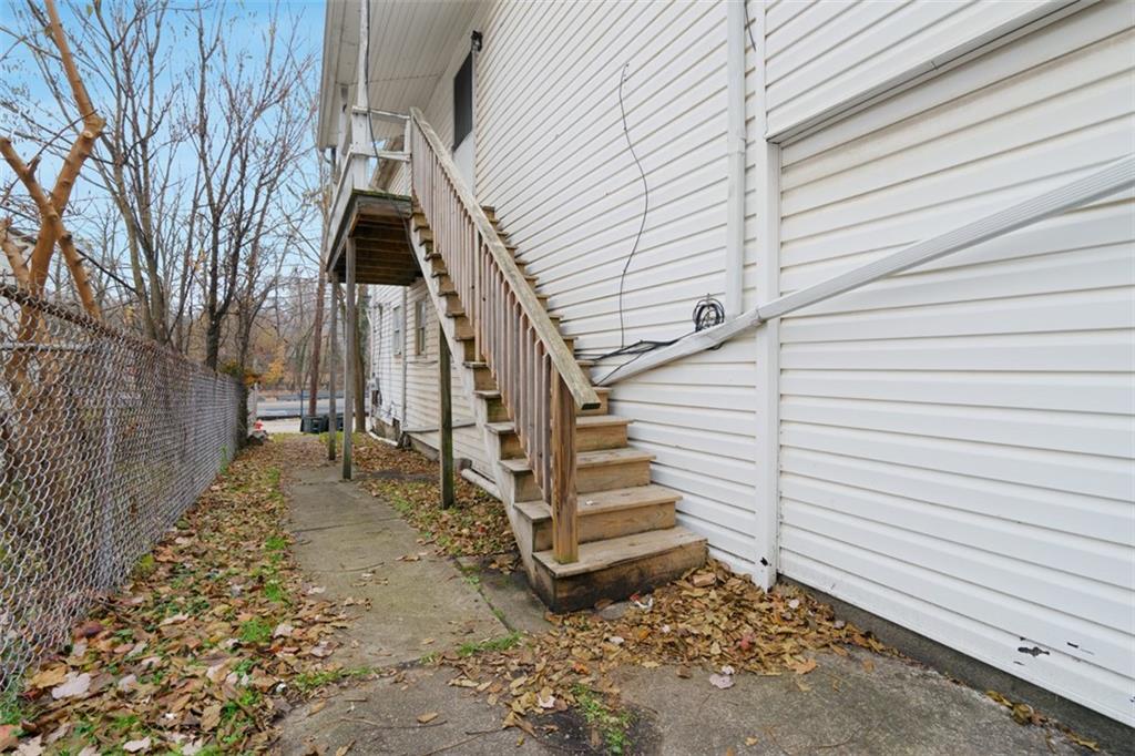 1057 Keene Street Springdale, PA 15144 - Photo 20 of 50 a view of a pathway with a house