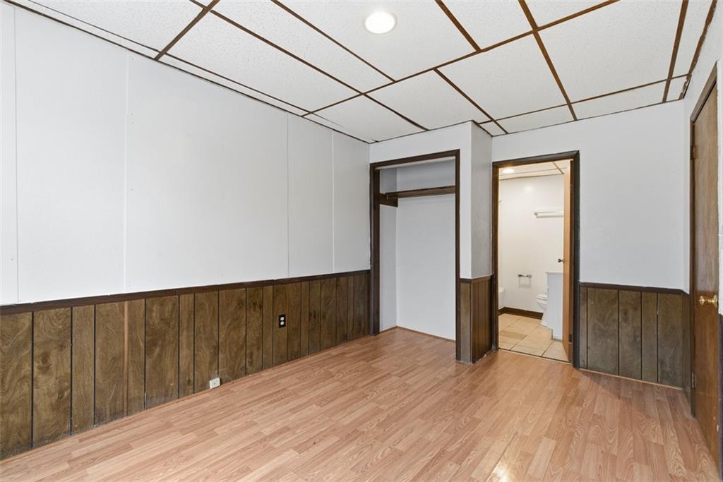 1057 Keene Street Springdale, PA 15144 - Photo 27 of 50 a view of a room with wooden floor