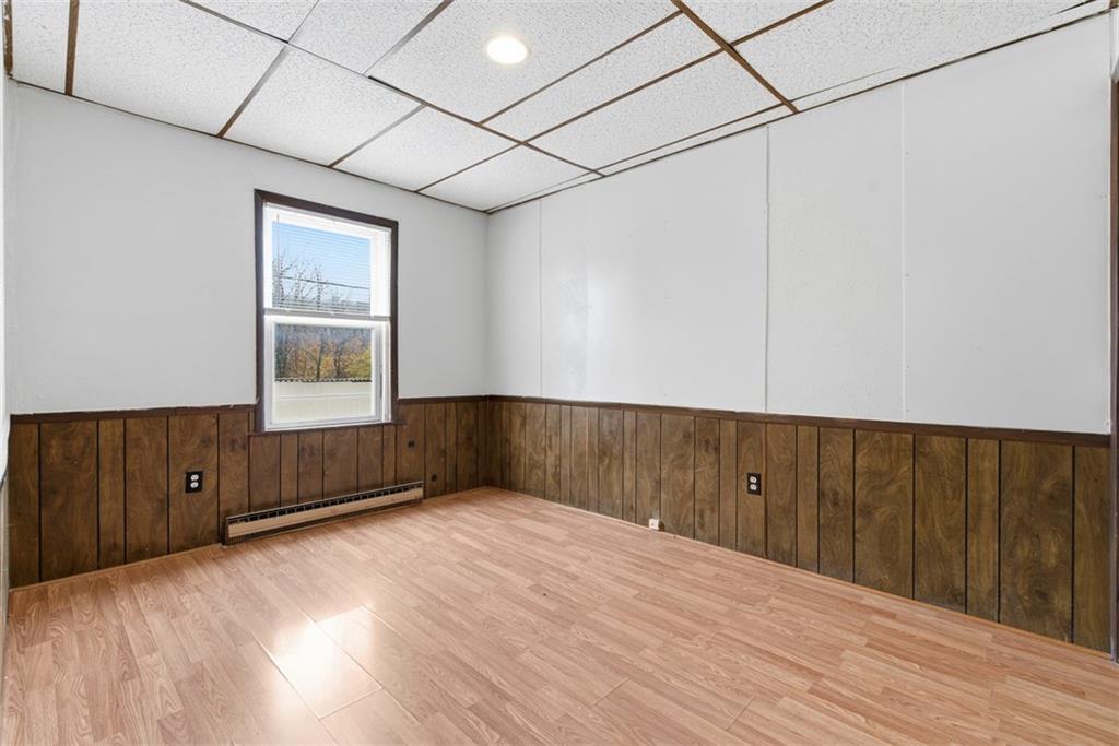 1057 Keene Street Springdale, PA 15144 - Photo 30 of 50 a view of an empty room with wooden floor