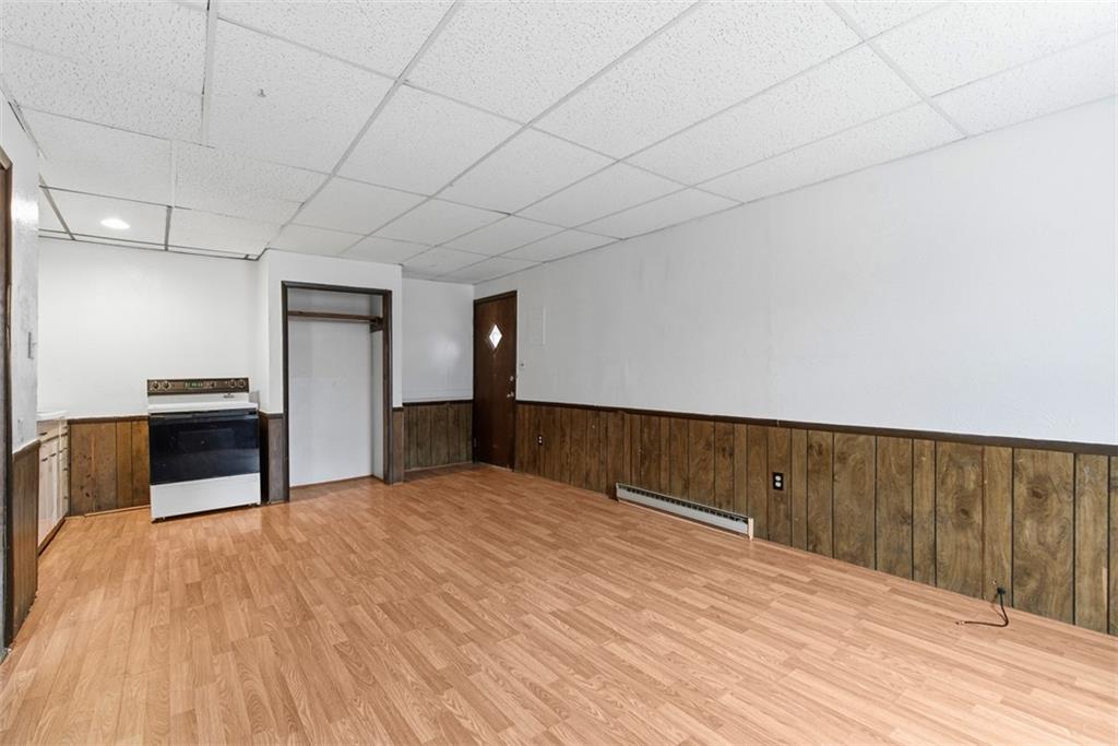 1057 Keene Street Springdale, PA 15144 - Photo 31 of 50 a view of empty room with wooden floor