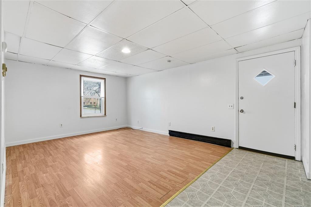 1057 Keene Street Springdale, PA 15144 - Photo 39 of 50 an empty room with windows