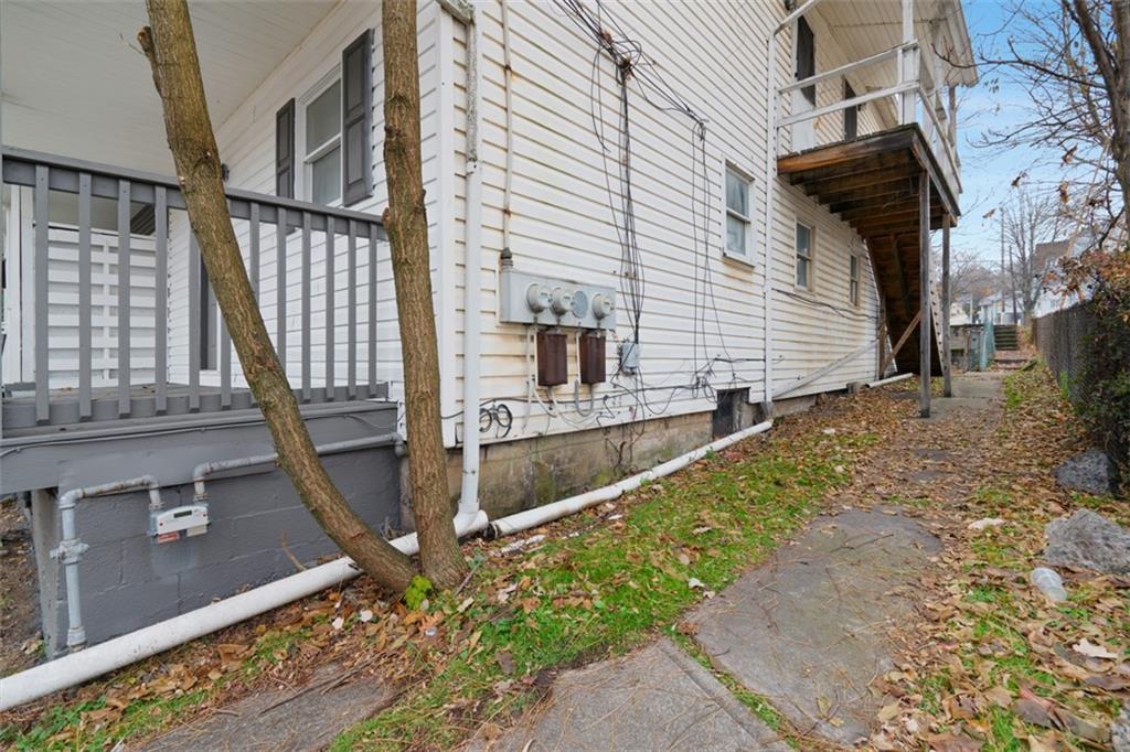 1057 Keene Street Springdale, PA 15144 - Photo 48 of 50 a view of a house with backyard and porch