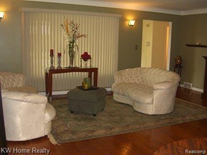 23110 Harding Street Oak Park, MI 48237 - Photo 7 of 19 LIVING ROOM WITH HARDWOOD FLOORS