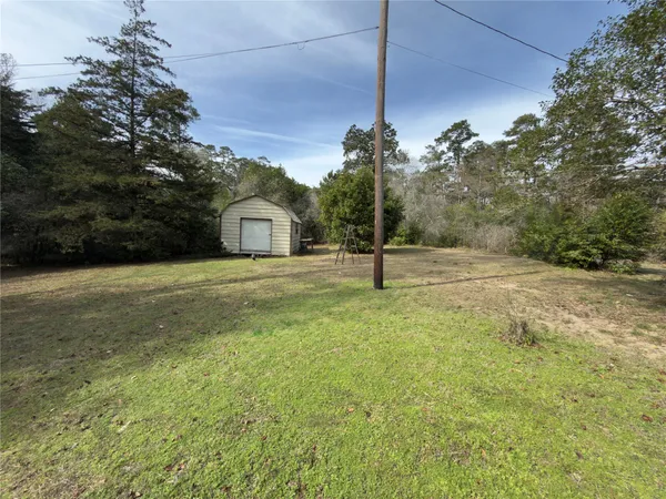 a view of a house with a park