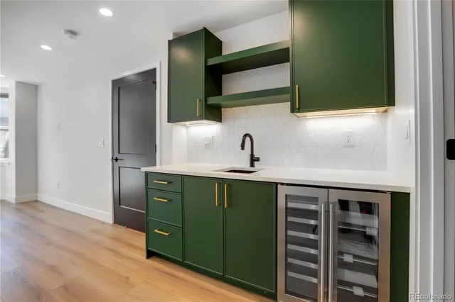 a kitchen with a sink and a microwave