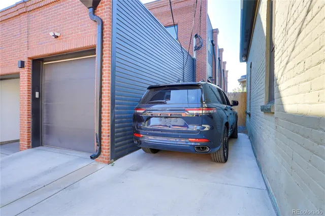 a view of car parked in front of house