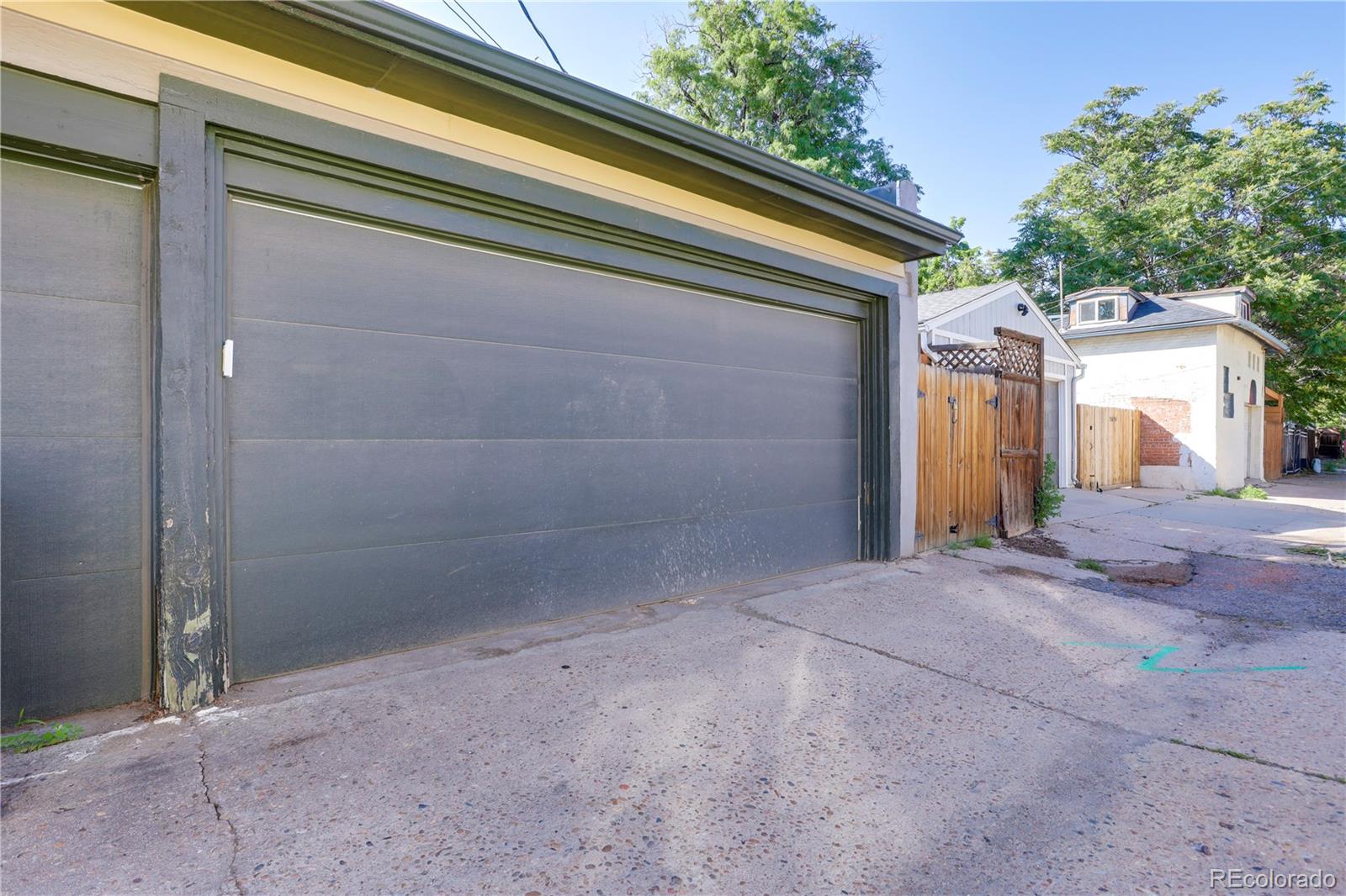 1065-25 25th Street, Unit A Denver, CO 80205 - Photo 37 of 45 a view of backyard and garage