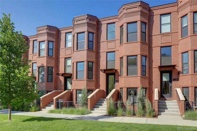 a front view of a multi story building