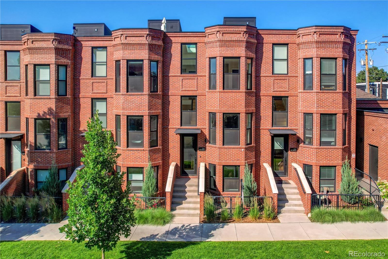 1065-25 25th Street, Unit A Denver, CO 80205 - Photo 44 of 45 a front view of a multi story building