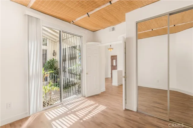 a view of a bathroom with a glass door