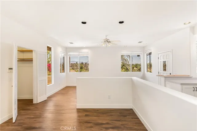 a view of livingroom with furniture and wooden floor