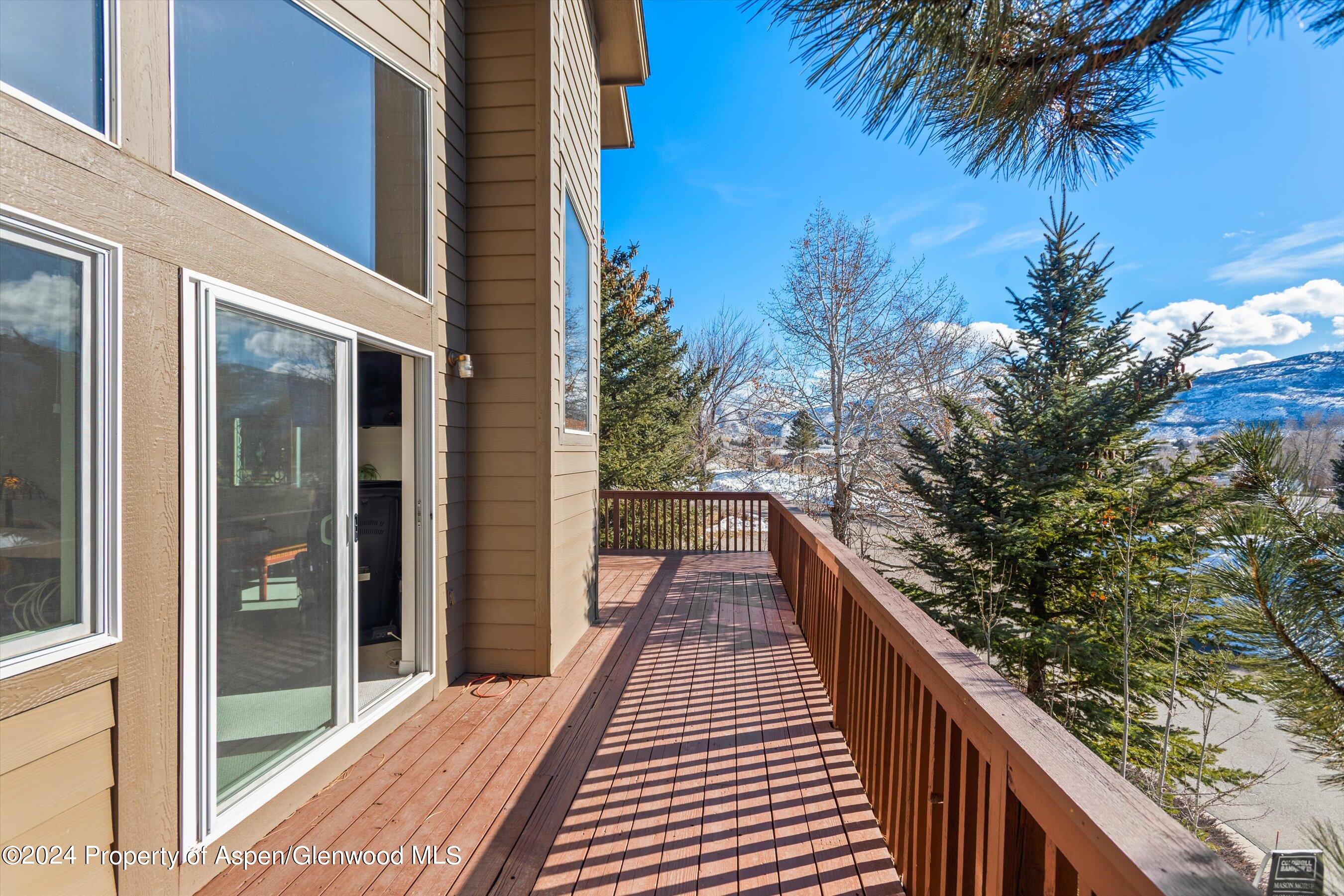 16 Pine Ridge Road Basalt, CO 81621 - Photo 15 of 63 a view of balcony with wooden floor and fence
