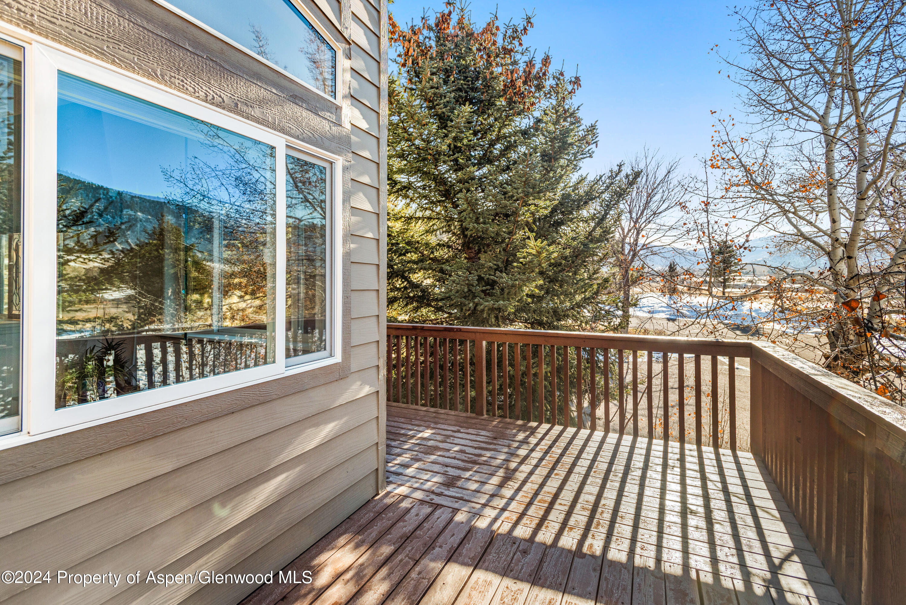16 Pine Ridge Road Basalt, CO 81621 - Photo 19 of 63 a view of balcony with wooden floor and fence