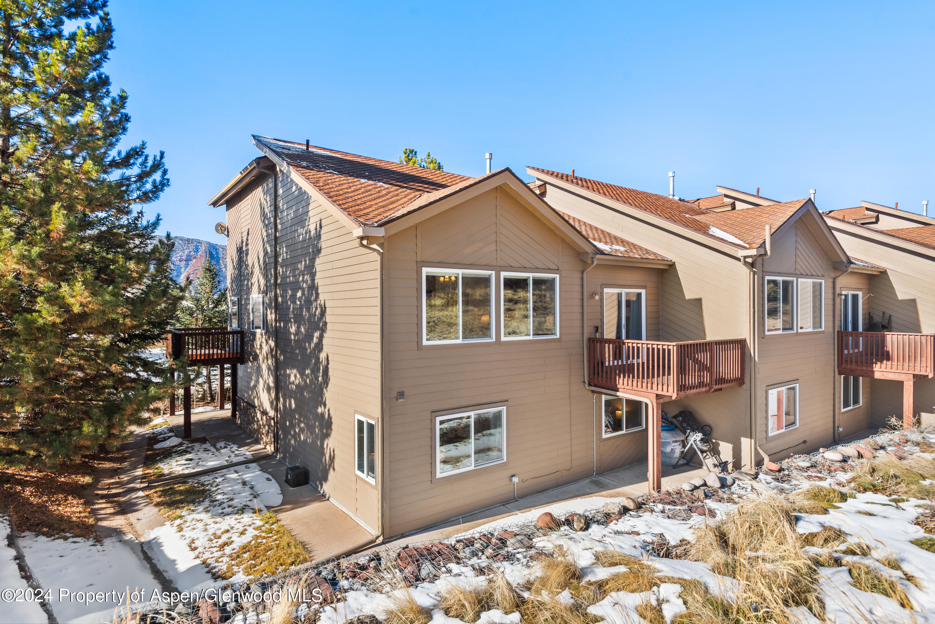 16 Pine Ridge Road Basalt, CO 81621 - Photo 46 of 63 a view of a house with a yard and sitting area