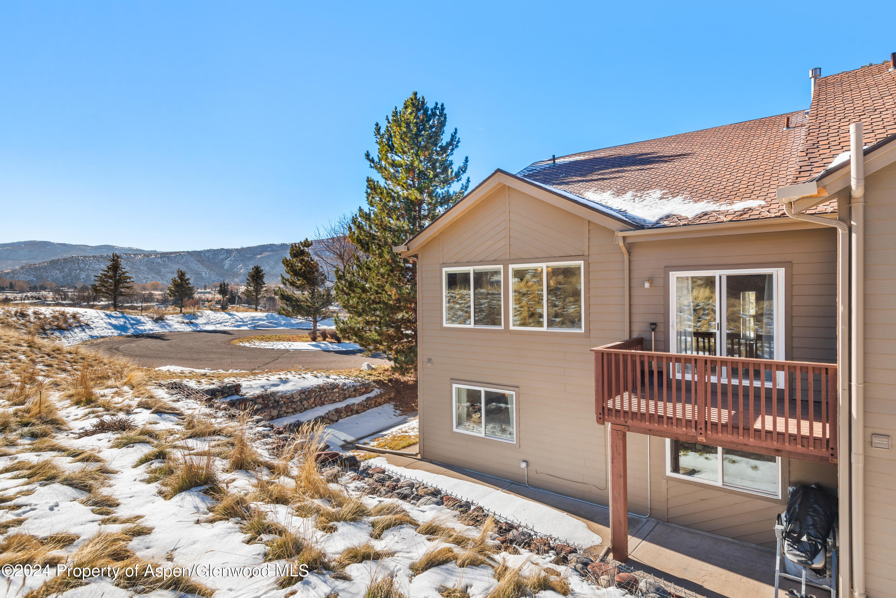 16 Pine Ridge Road Basalt, CO 81621 - Photo 49 of 63 a front view of a house with a yard