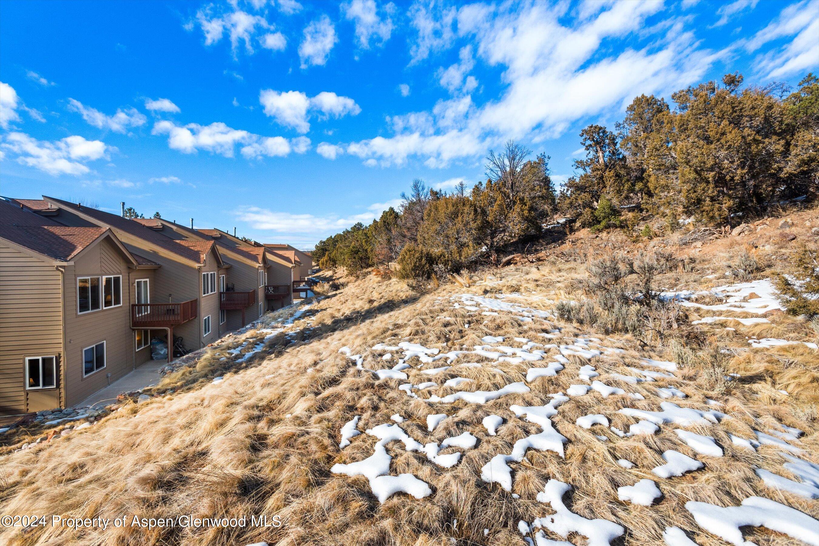 16 Pine Ridge Road Basalt, CO 81621 - Photo 53 of 63 a view of a house with a snow in the yard