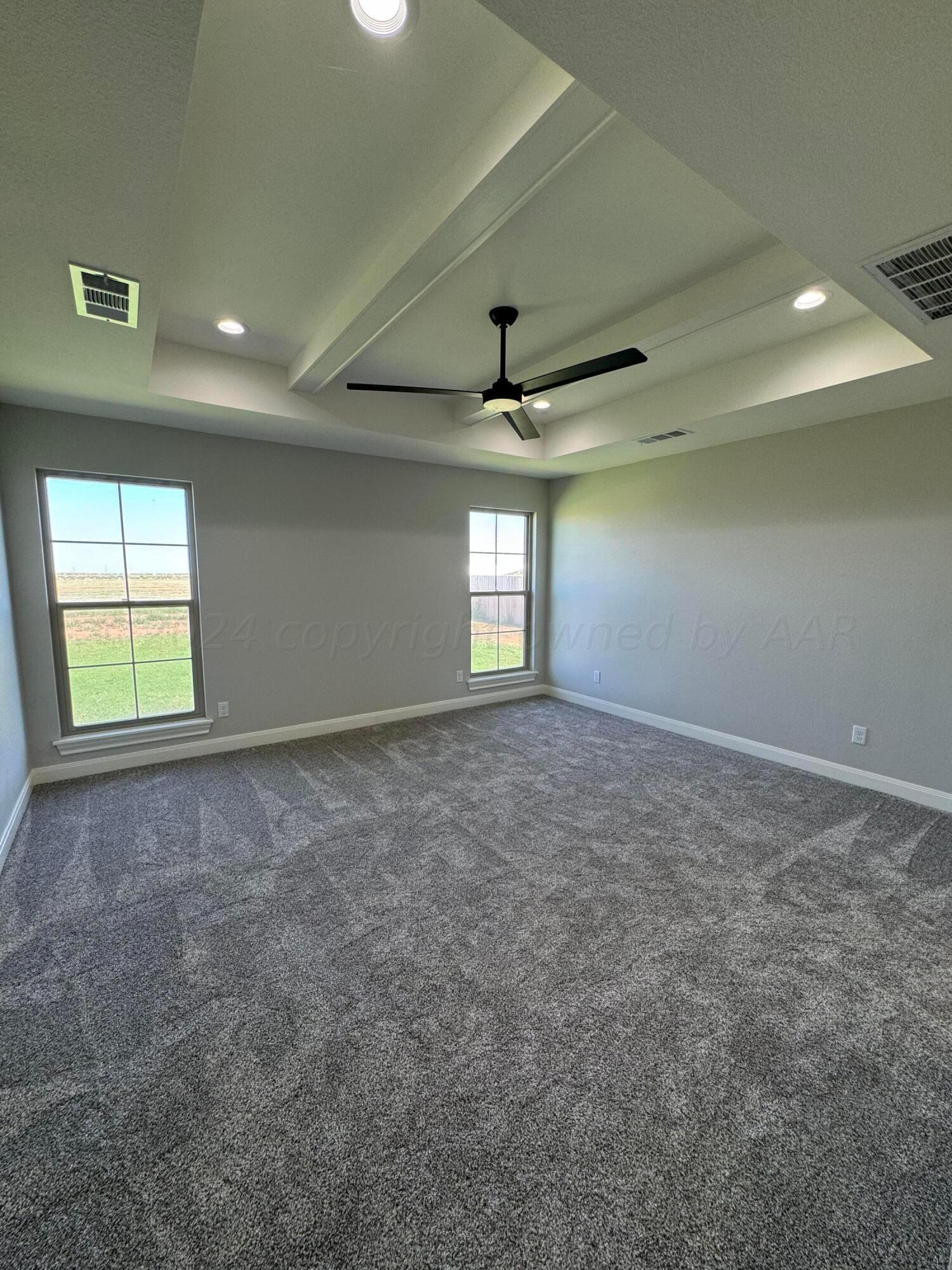 3801 Whitetail Springs Road Amarillo, TX 79119 - Photo 7 of 13 a view of empty room with windows