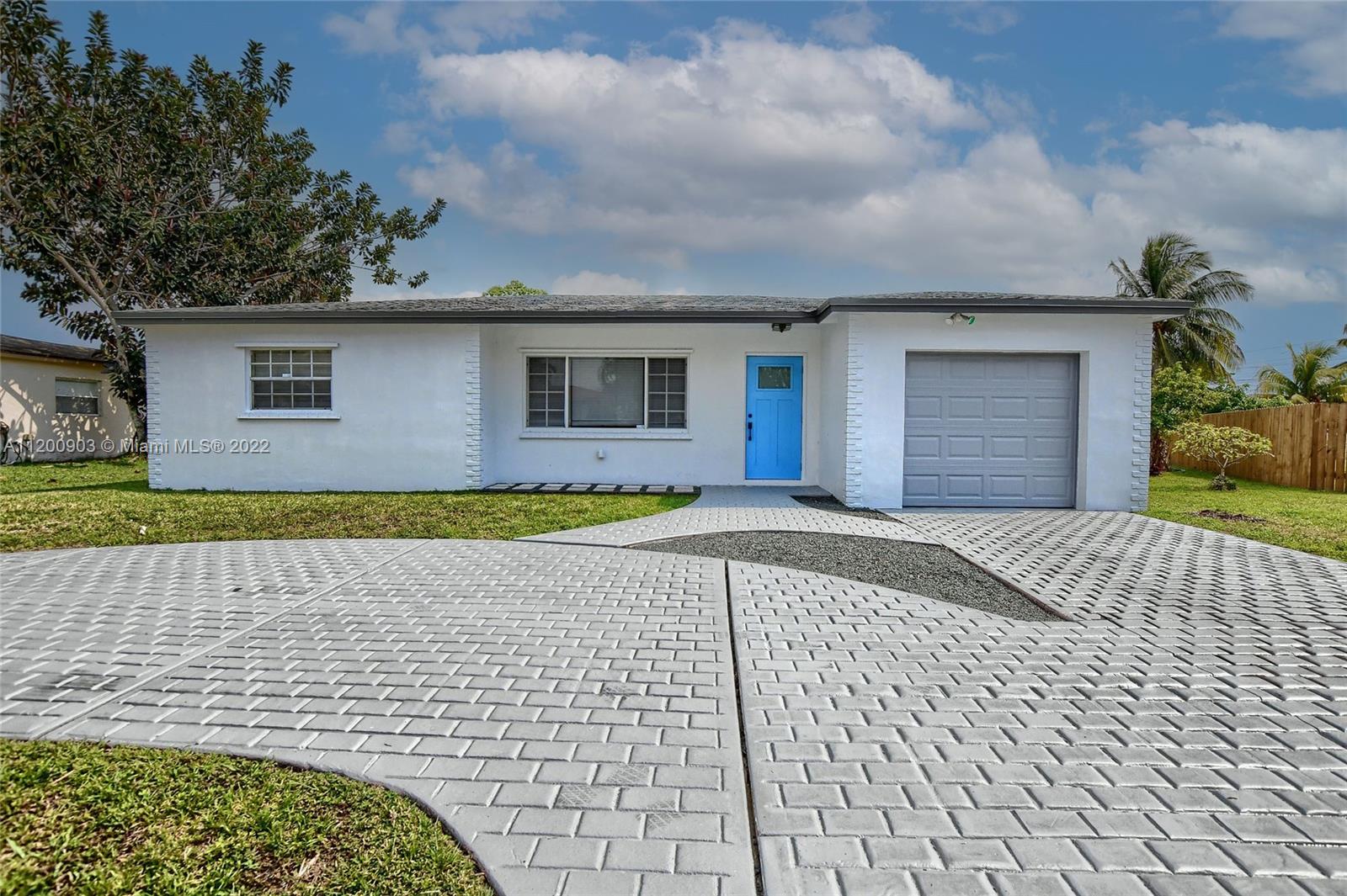 10950 Granite Street Boca Raton, FL 33428 - Photo 5 of 27 a view of front door of house along with yard