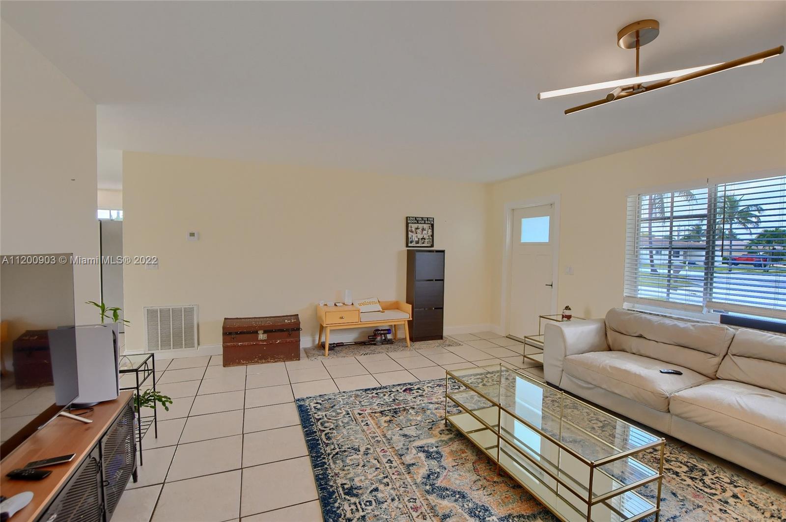 10950 Granite Street Boca Raton, FL 33428 - Photo 8 of 27 a living room with furniture