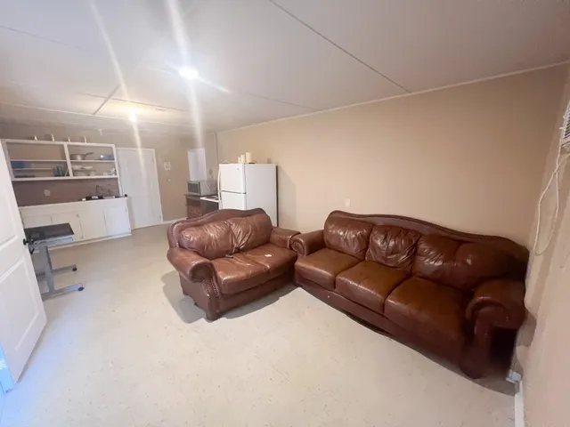 a living room with a couch and a couch