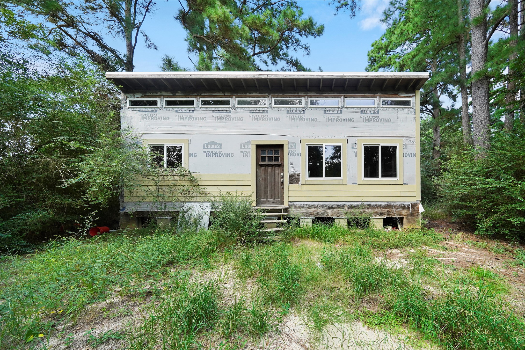 22111 Loblolly Road Tomball, TX 77377 - Photo 3 of 11 a front view of a house with a yard