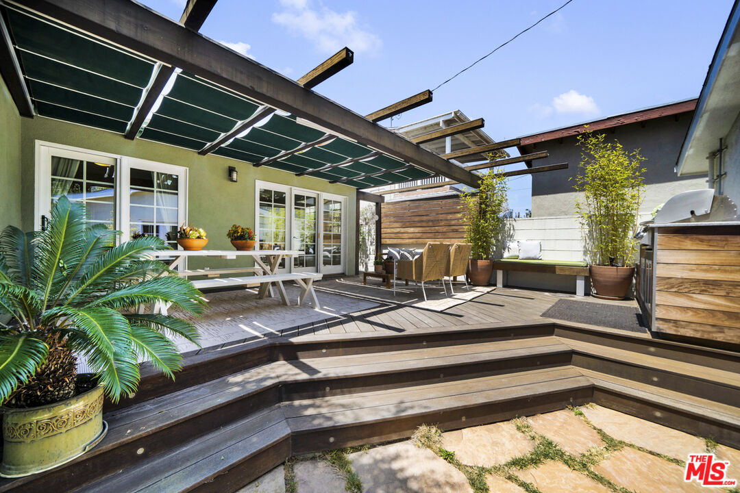 3448 Redwood Avenue Los Angeles, CA 90066 - Photo 18 of 25 a view of a house with a patio
