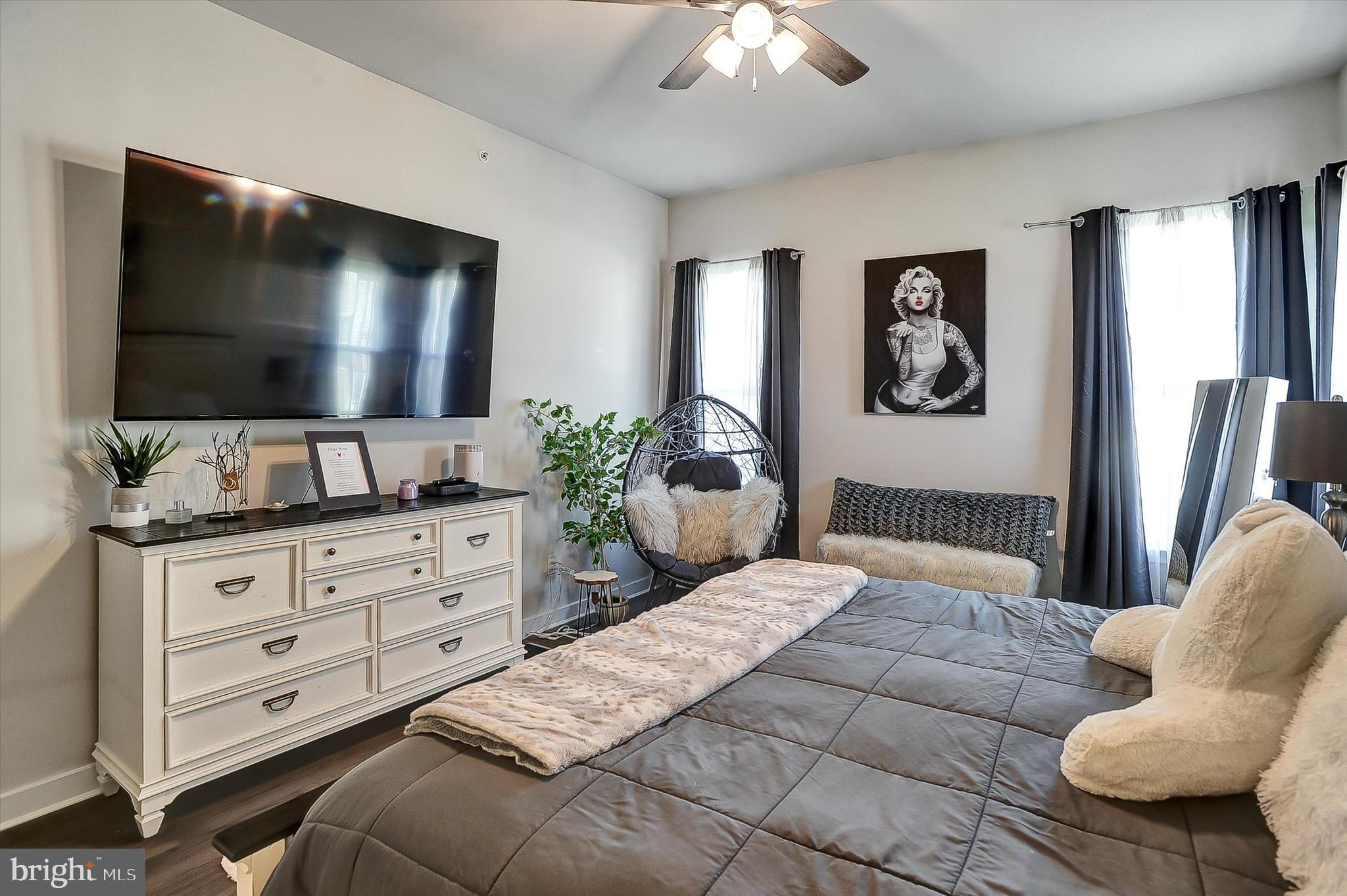 739 Cascade Way Kennett Square, PA 19348 - Photo 14 of 76 a bedroom with a bed and a flat screen tv