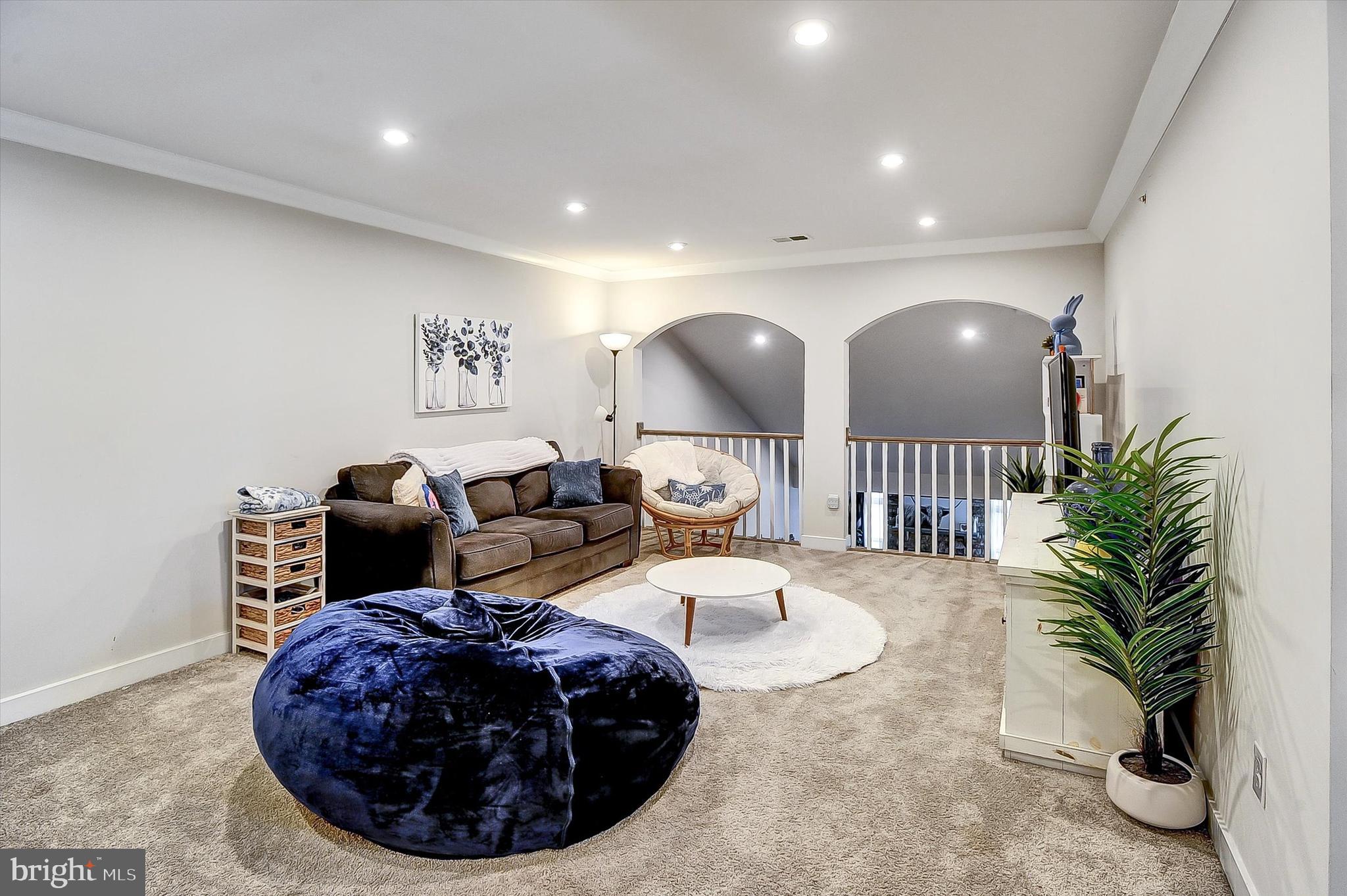 739 Cascade Way Kennett Square, PA 19348 - Photo 25 of 76 a living room with furniture and a mirror