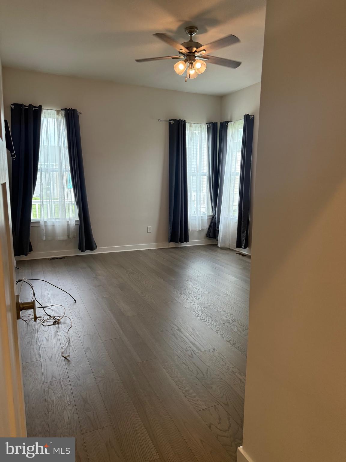 739 Cascade Way Kennett Square, PA 19348 - Photo 53 of 76 wooden floor in an empty room with a window