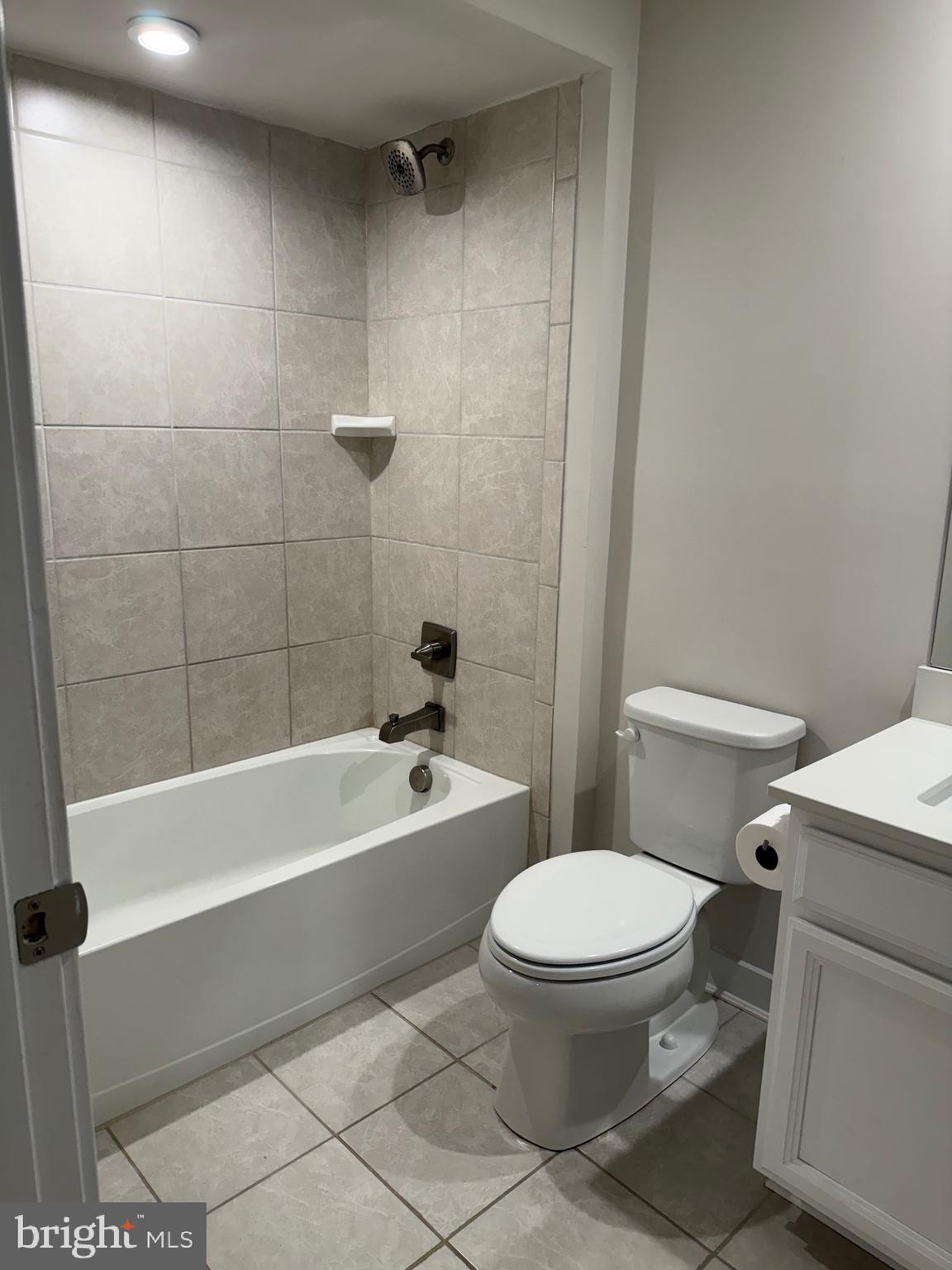 739 Cascade Way Kennett Square, PA 19348 - Photo 76 of 76 a white toilet sitting next to a bath tub and a shower