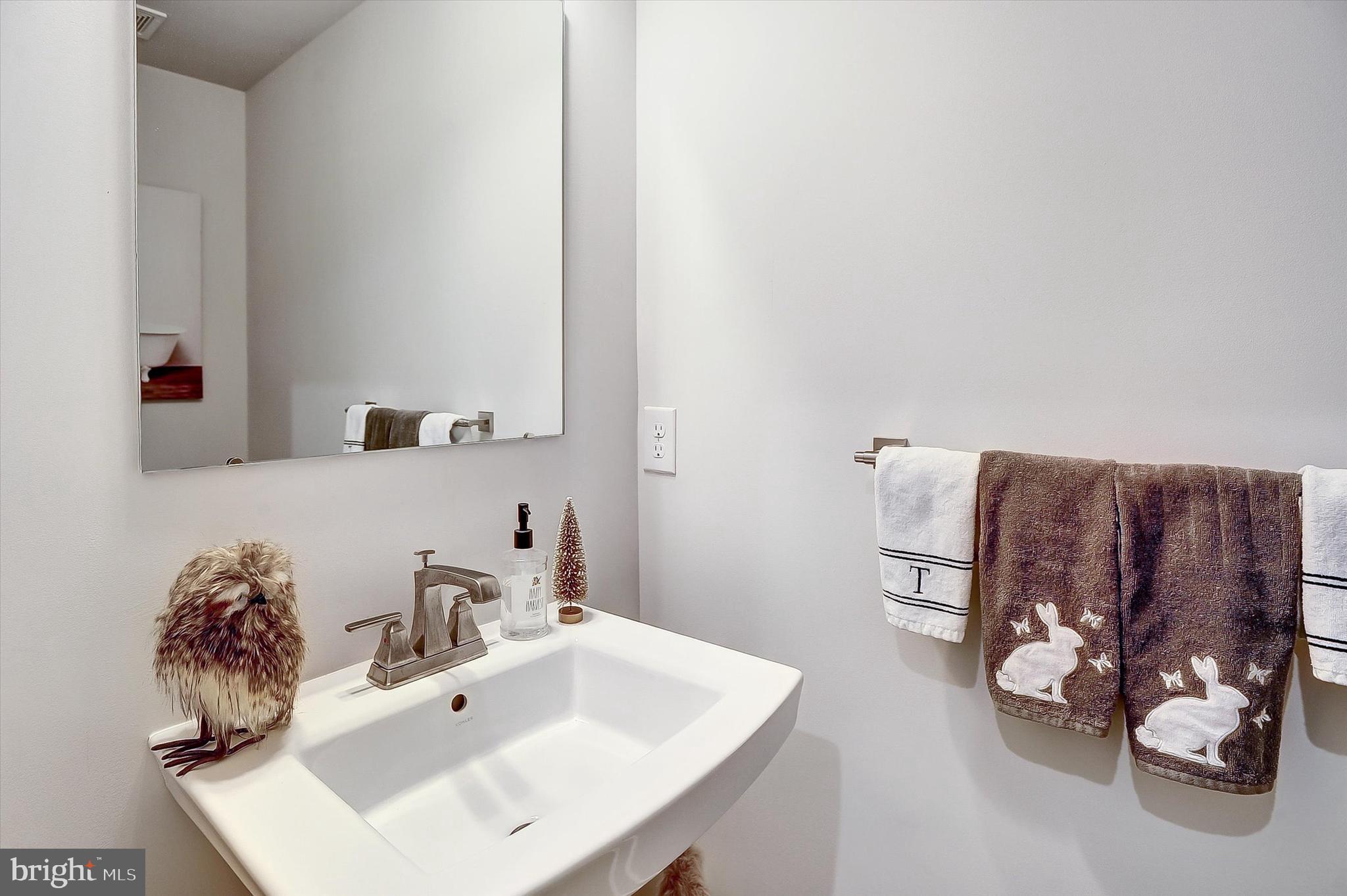 739 Cascade Way Kennett Square, PA 19348 - Photo 8 of 76 a bathroom with a sink vanity and a mirror