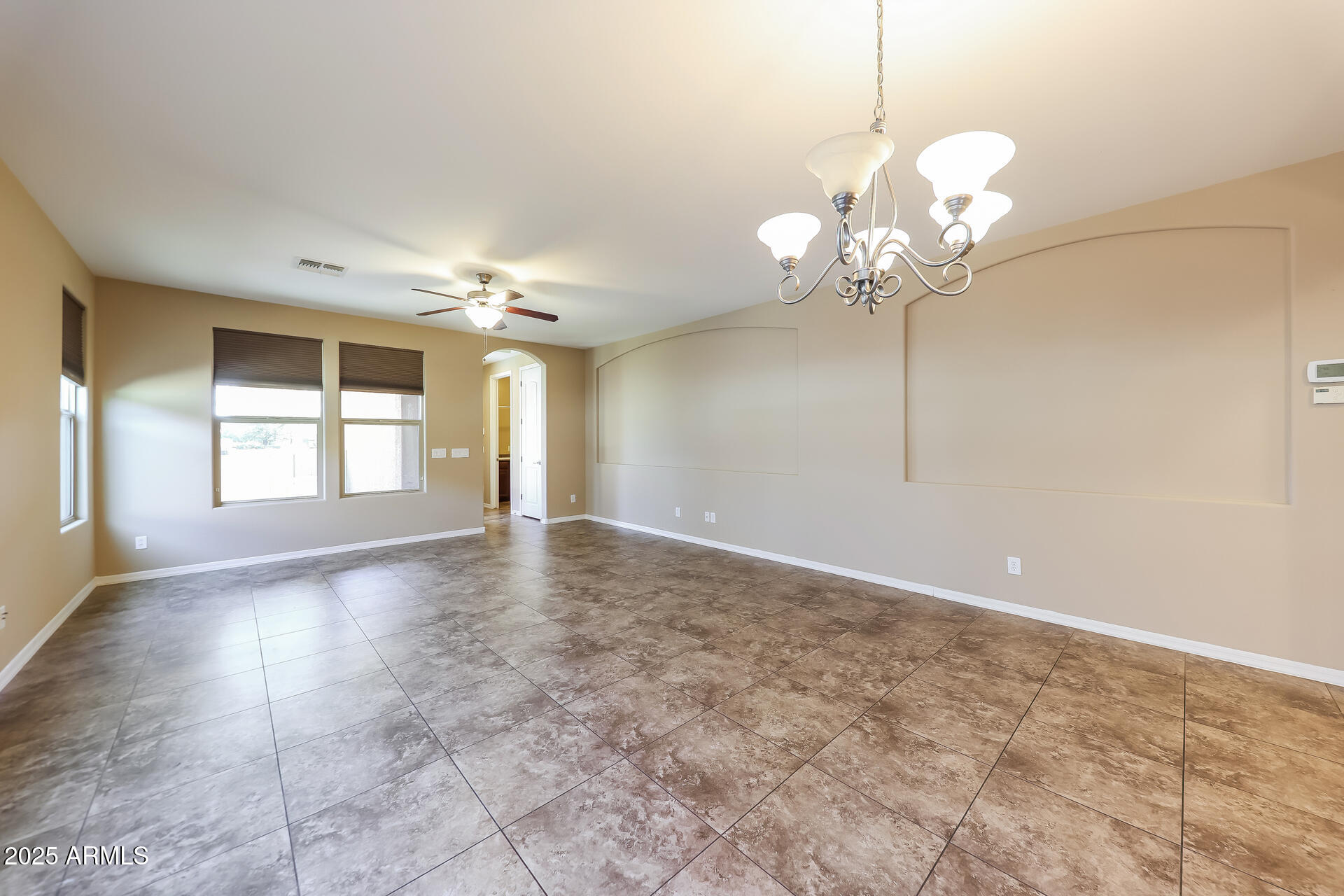20693 West Ridge Road Buckeye, AZ 85396 - Photo 11 of 16 a view of an empty room with a window