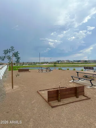a view of swimming pool with outdoor space and seating area
